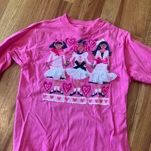 Adorable pink long sleeved shirt with three dancers